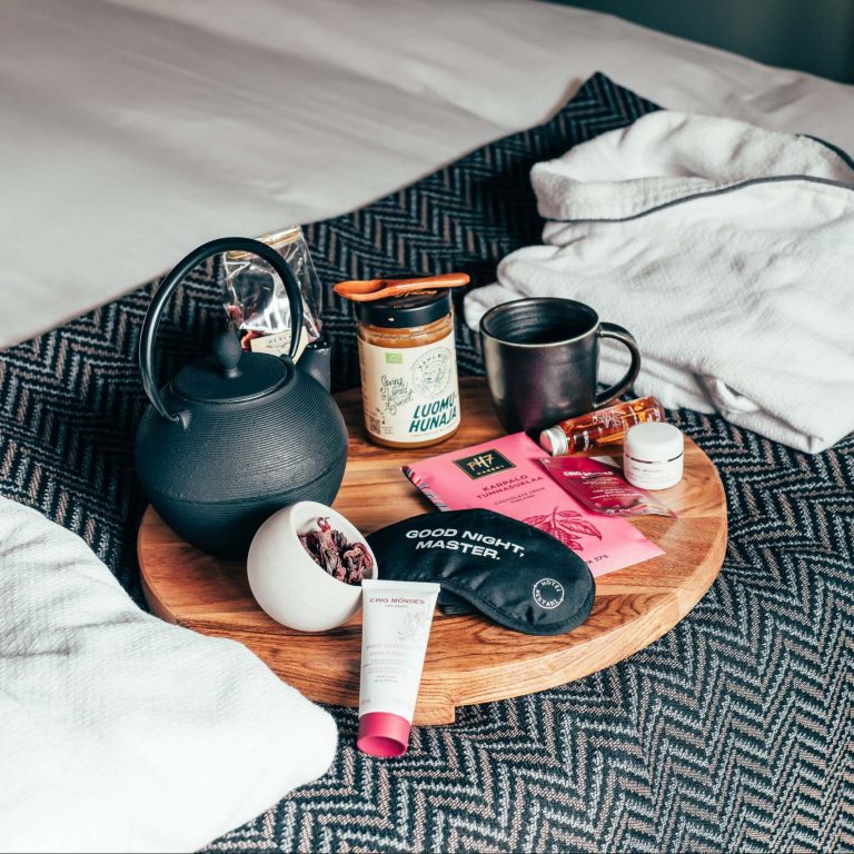 Cool Down package includes e.g. a sleep mask, ear plugs, spa package, a scented oil, chocolate and tea as well as a relaxing playlist.